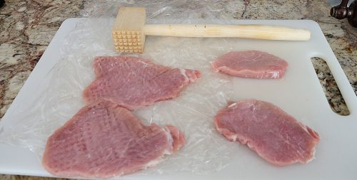 Pork cutlets with meat mallet