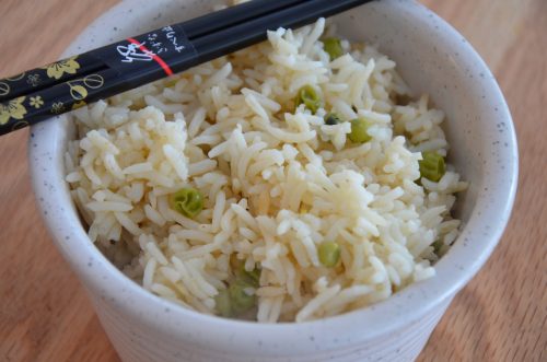 Basmati rice cooked perfectly, not sticky, i a bowl.