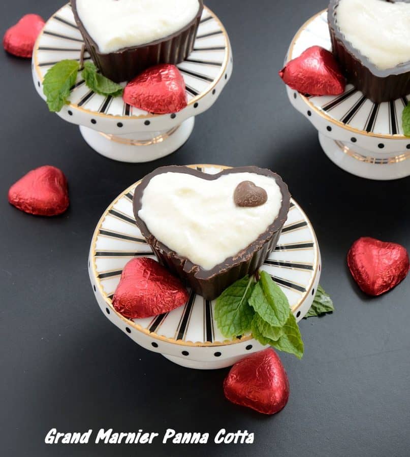 Chocolate hearts filled with panna cotta on china pedestal