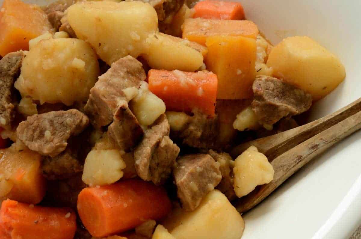 Close up of stewed beef, carrots and potatoes.