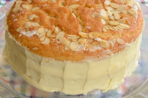 Vanilla cake with honey almond topping and bavarian cream icing