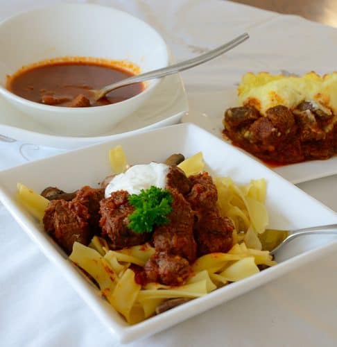 goulash-over -noodles-and-goulash-soup-in-a-bowl