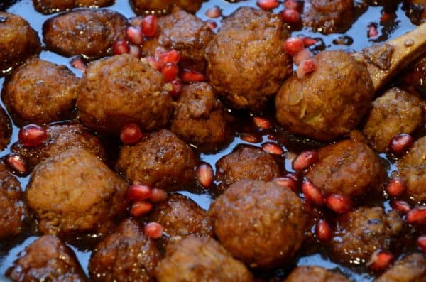 pomegranate-meatballs-in-skillet-with-sauce