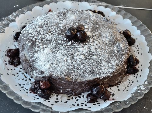 Flourless Chocolate Cake Garnished with Cherries