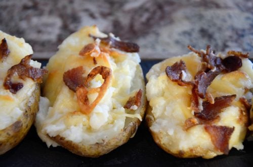 Baked Potatoes topped with Cheddar and Bacon Bits