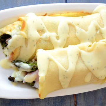 Ham and Asparagus Crepes on a plate.