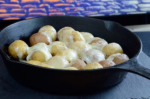 Raclette and Gourmet Potatoes in Cast Iron Skillet