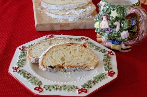 Classic Christmas Stollen sliced on a tea plate