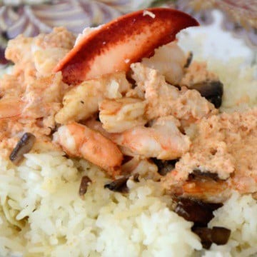 Creamy lobster in whisky sauce over a bed of rice.