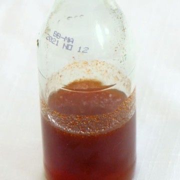 Small container of paprika syrup