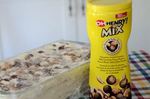 Oh Henry mix container in front of ice box cake