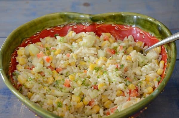 Orzo Corn Salad with Cucumber Feta Dressing in a heart shaped bowl.