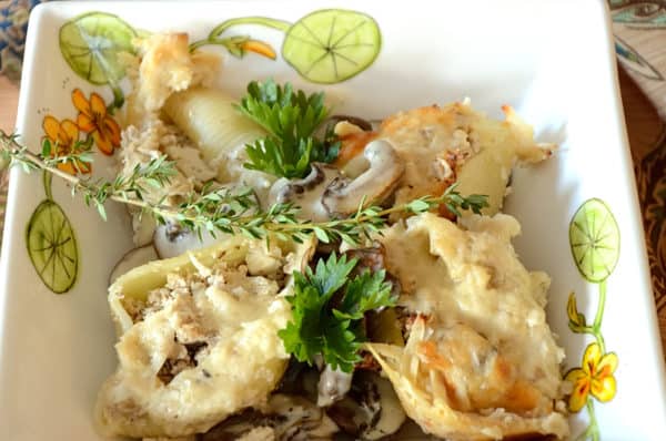 Pasta shells filled with chicken and walnut and a cream sauce.