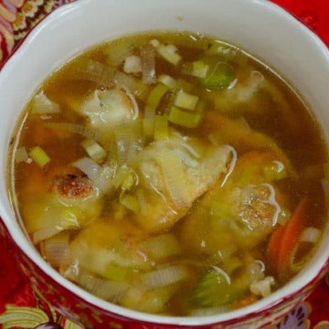 Chicken wonton soup in a bowl