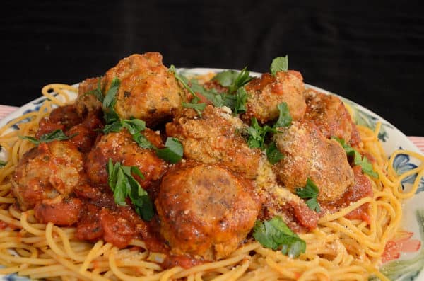 Platter of spaghetti with sauce and meatballs