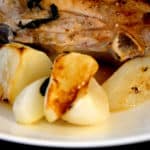 Glazed turnips, quartered and browned on a plate