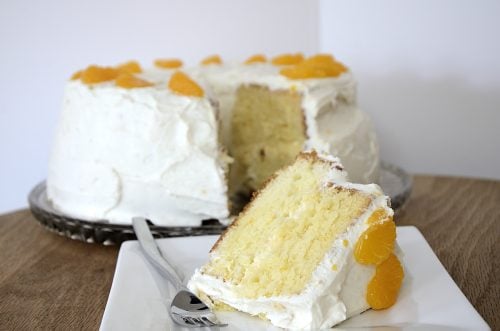 Mandarin Chiffon Layer cake with Yogurt Cream Cheese Frosting and decorated with mandarin pieces