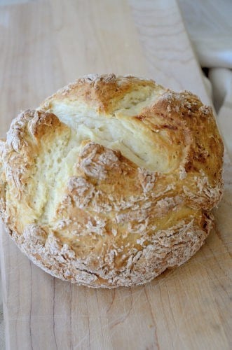 A round crusty loaf of traditional Irish Soda Bread
