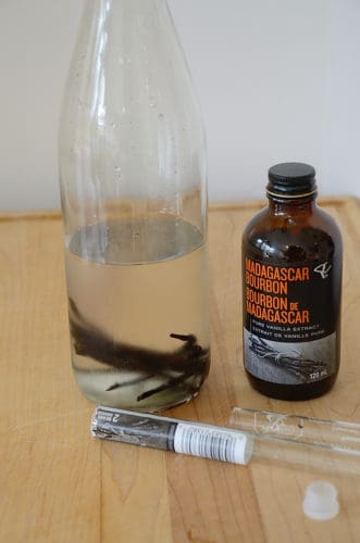 Vanilla bans submerged in a bottle with vodka to make vanilla extract