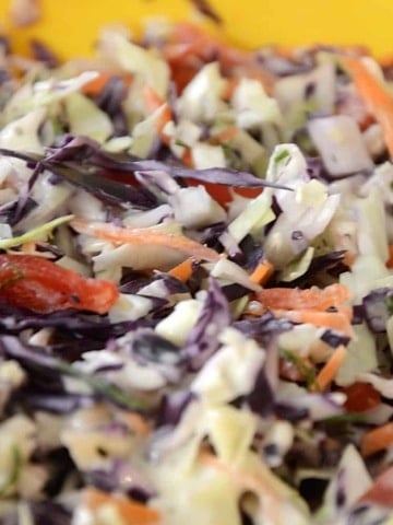 coursely grated red and green cabbage for coleslaw