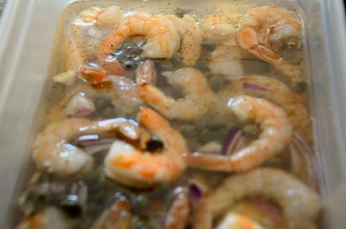 Jumbo shrimp and red onions marinating