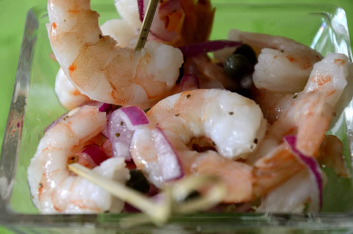 Jumbo shrimp in juicy marinade with skewers.