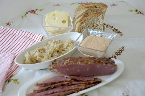 Ingredients for Reuben Sandwich - corned beef, sauerkraut, Swiss Cheese, Rye bread and Russian dressing