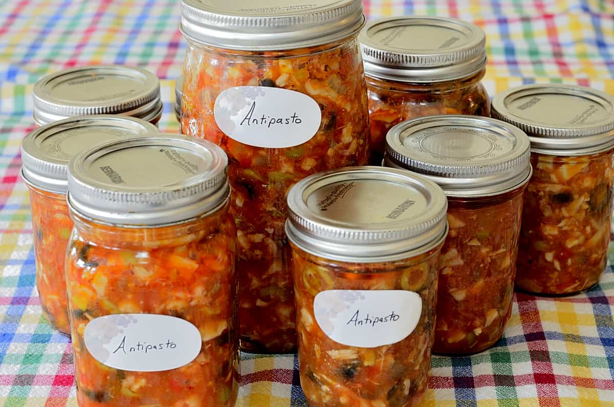 everal Mason jars of shrimp antipasto.