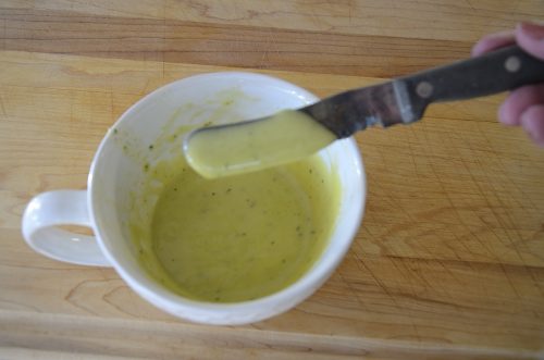 Sauce has thickened, is creamy and coats the knife blade.