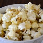Close up of Ranch flavoured popcorn in a large cup.