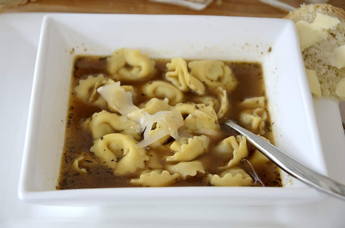 Fresh tortellini in a beefy broth.