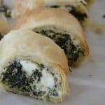 Slices of flaky phyllo filled with spinach and feta cheese.