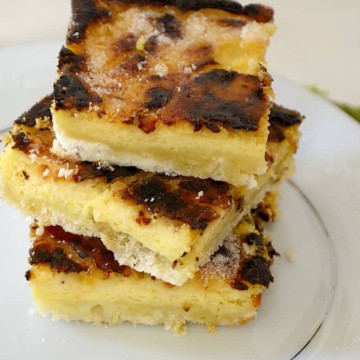 Stack of Creme Brulee squares on plate.