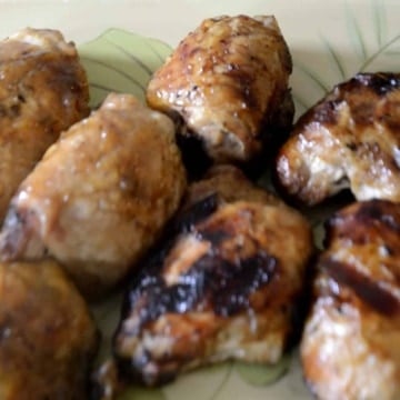 Crispy grilled chicken thighs with sweet, tangy Jezebel sauce.