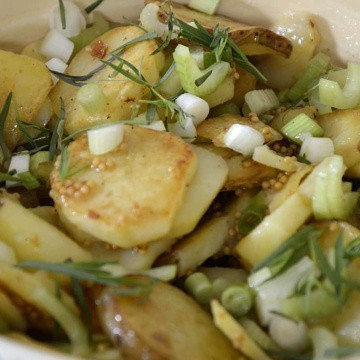 Crispy grilled potato slices tossed with celery, green onions and mustard vinaigrette.