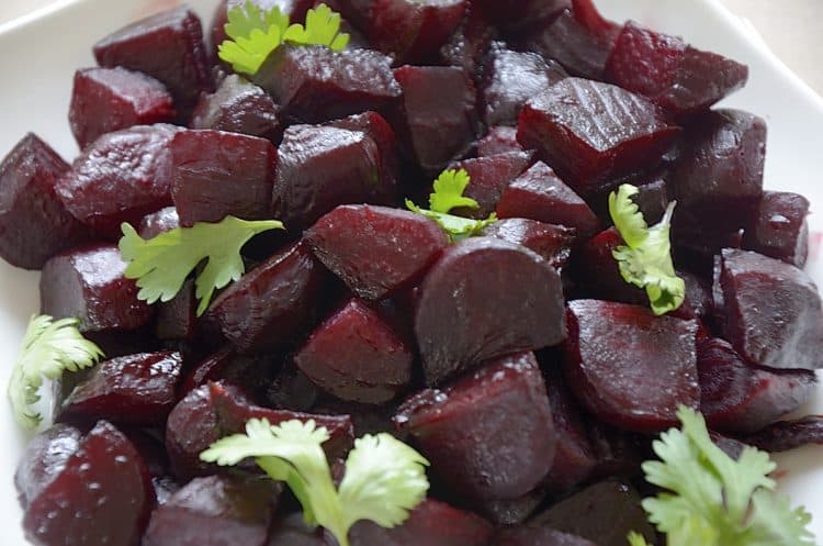 Close up of Roasted Balsamic Beets with cilantro garnish.