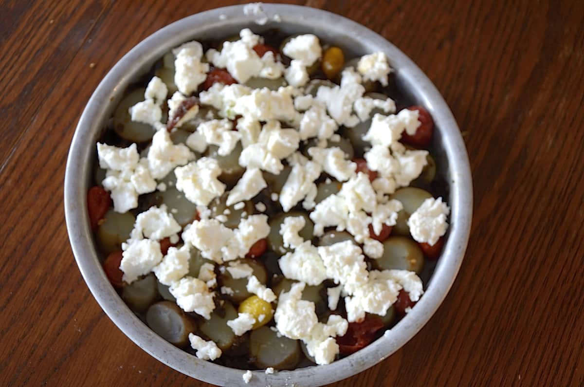 Potato and cherry tomato tarte tatin ready for the oven.