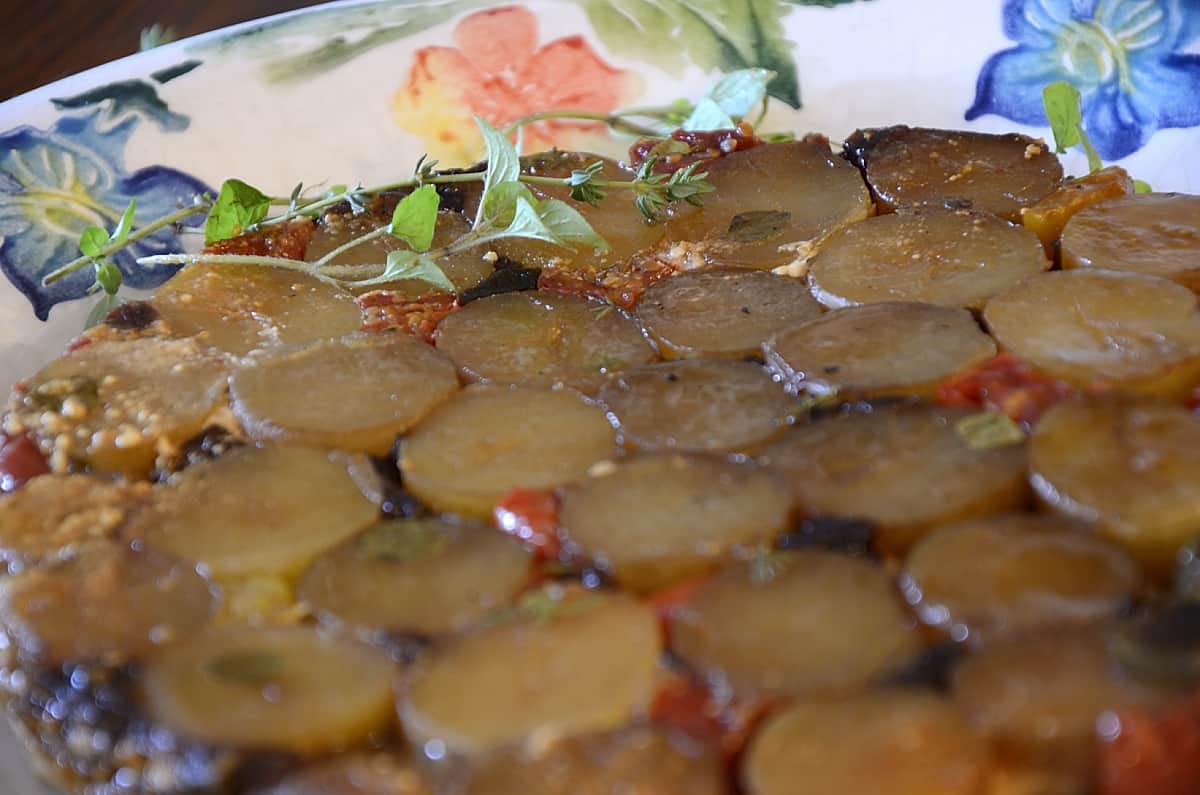 Full potato and cherry tomato tarte tatin fresh out of the oven.