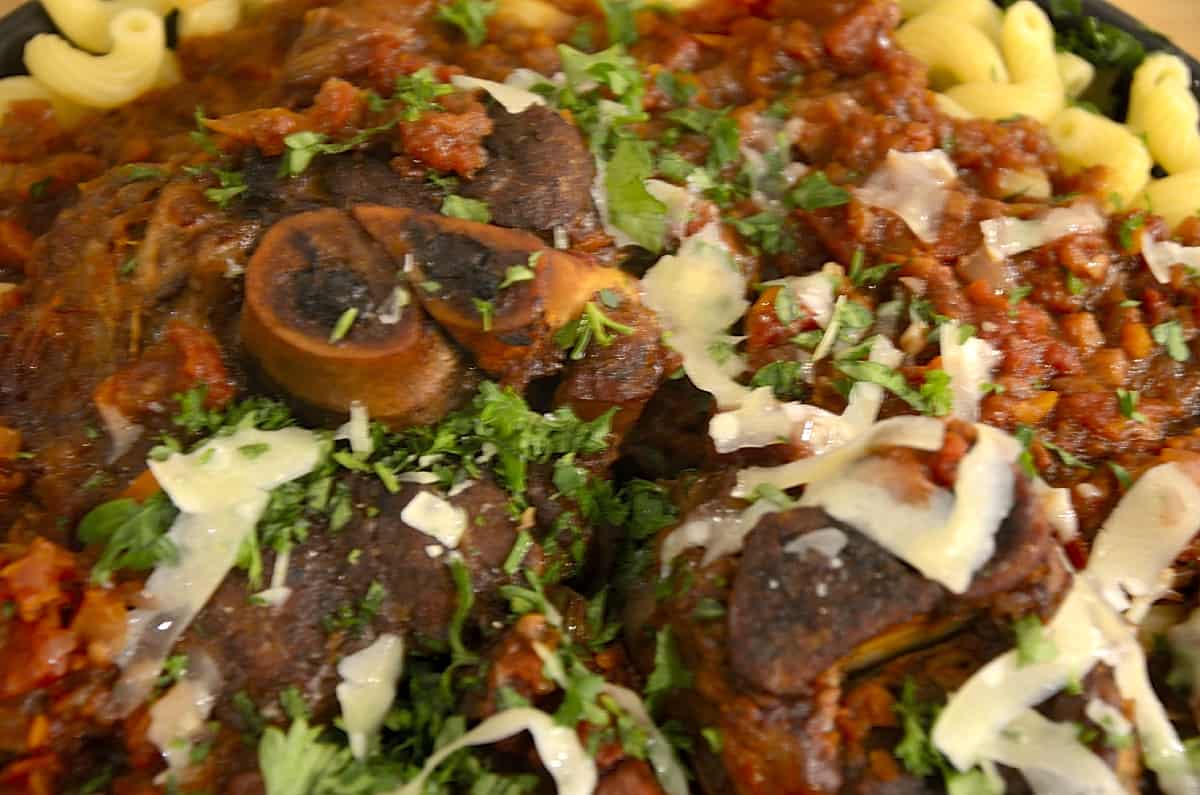 Braised pork osso buco close up.