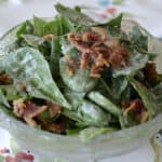Baby spinach and crispy bacon bits tossed in a creamy dressing.