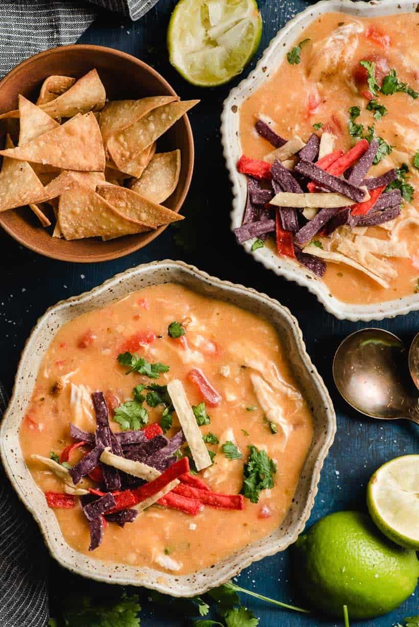 Creamy tomato soup with peppers and tortillas.
