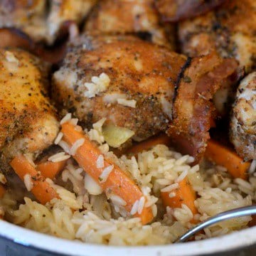 Chicken rice casserole with a scoop out.