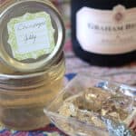 Champagne Jelly in a dish with jars of Champagne Jelly beside.