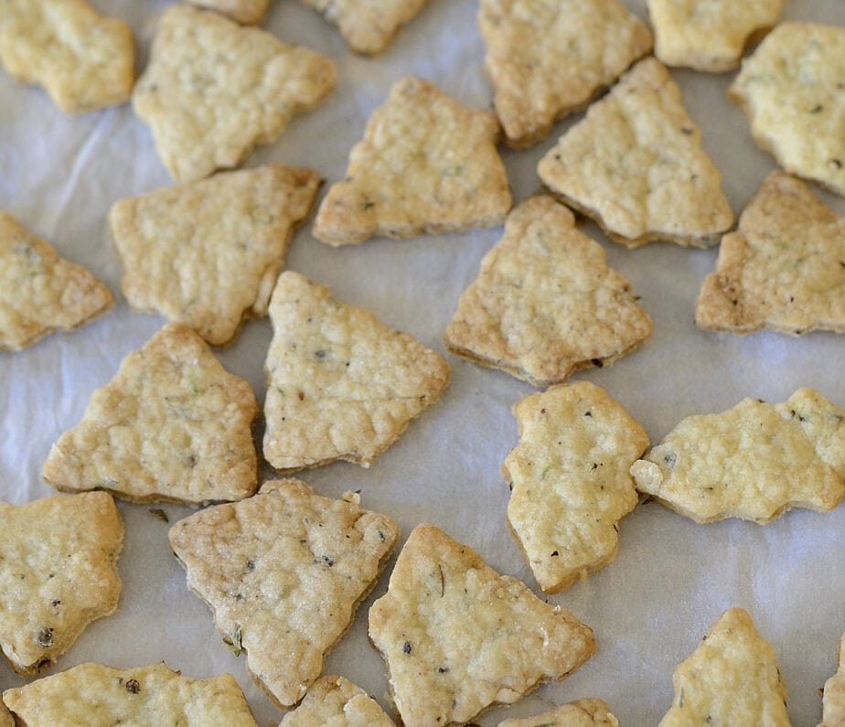 Champagne crackers cut in to Christmas tree and holly shapes.