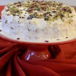 Italian Christmas Pudding Cake on a pedestal plate.