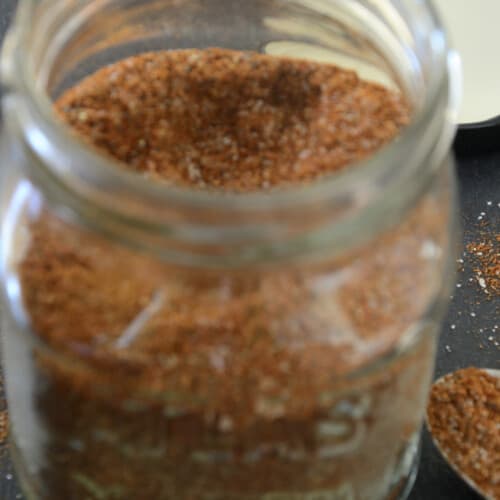 Jar of mix of spices used as dry rub for steak, ribs etc.