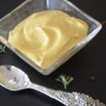 Small dish of Curry Mustard Mayonnaise Sauce.