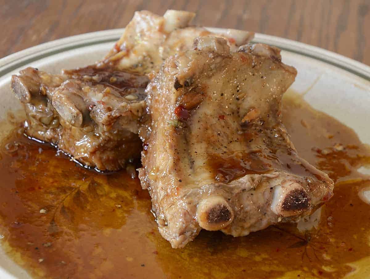 Back ribs in Asian sauce with sesame oil and chili garlic sauce.