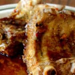 Close up of glossy ribs with mahogany soy glaze.