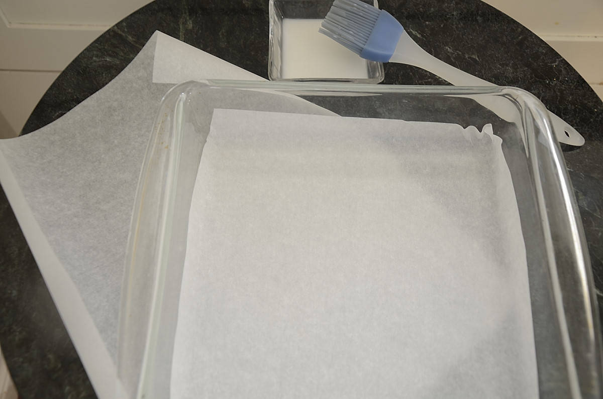 A baking pan lined with parchment paper.
